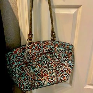 Pre owned  Patricia Nash turquoise bag. Beautiful bag.